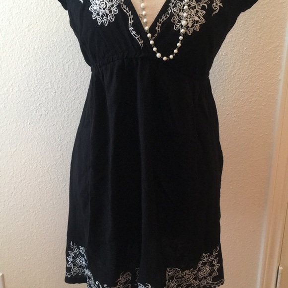 Angie flirty black dress! Embroidered top and hem. - Picture 3 of 8